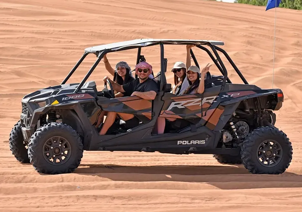 4 Seater Polaris RZR 1000cc dune buggy on red sand