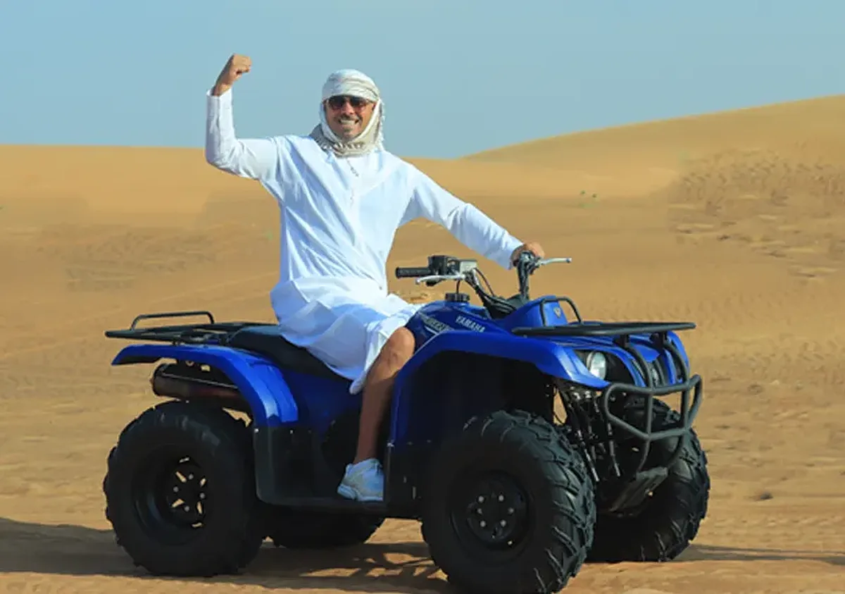 Yamaha Grizzly quad bike on desert trail